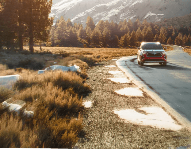 car driving on a scenic roat